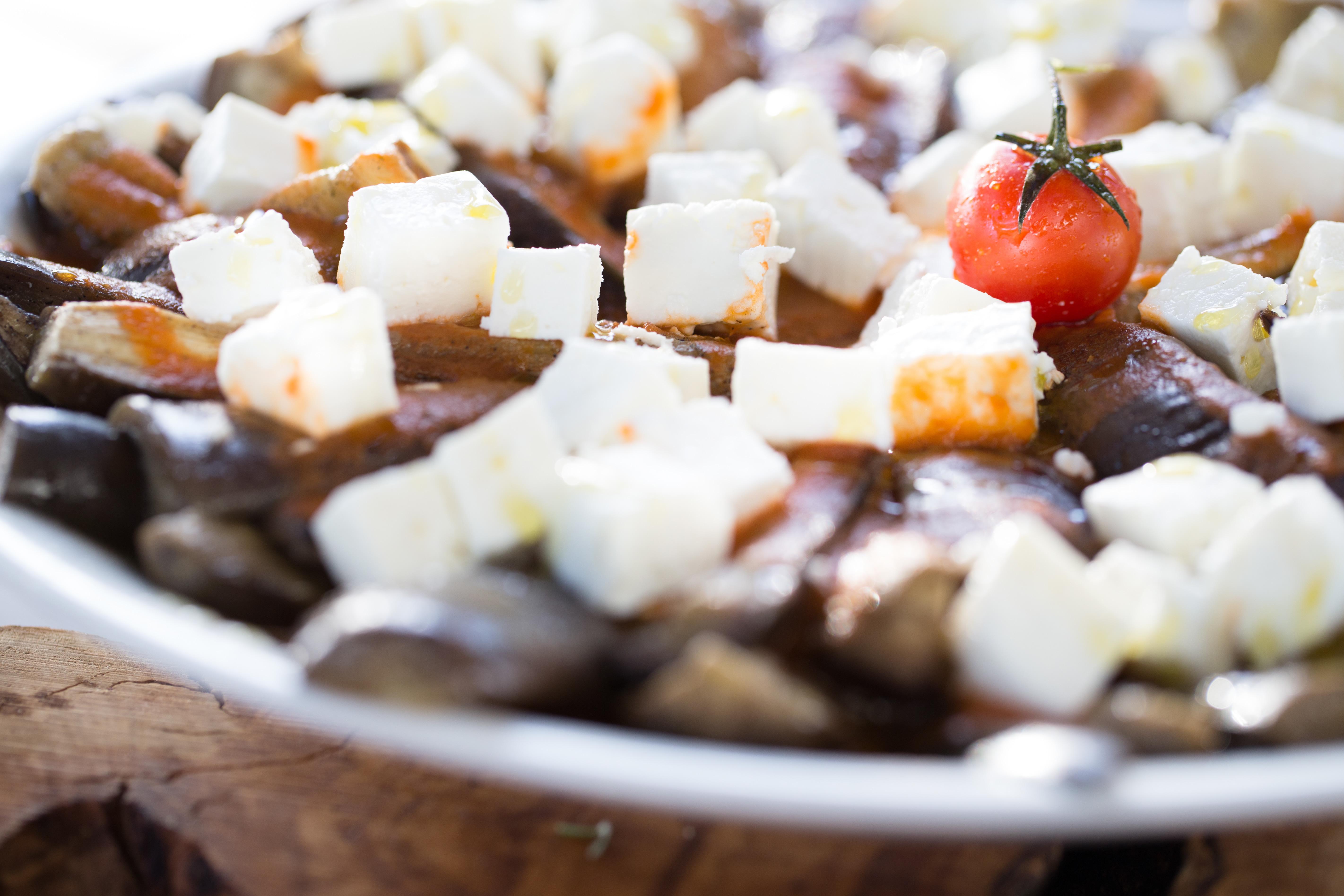 Hotel Almyra Paphos Exteriér fotografie Aubergine, feta cheese and tomato salad